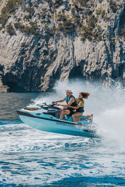 Alcudia: JetSki Tour Coll Baix beach & Caves (free Photos) - Passing Alcanada lighthouse island