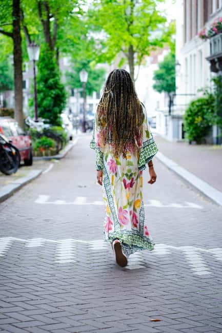 Amsterdam: Customizable Photography Tour with 9-10 Photos - Crossing Amsterdam’s canals and side streets
