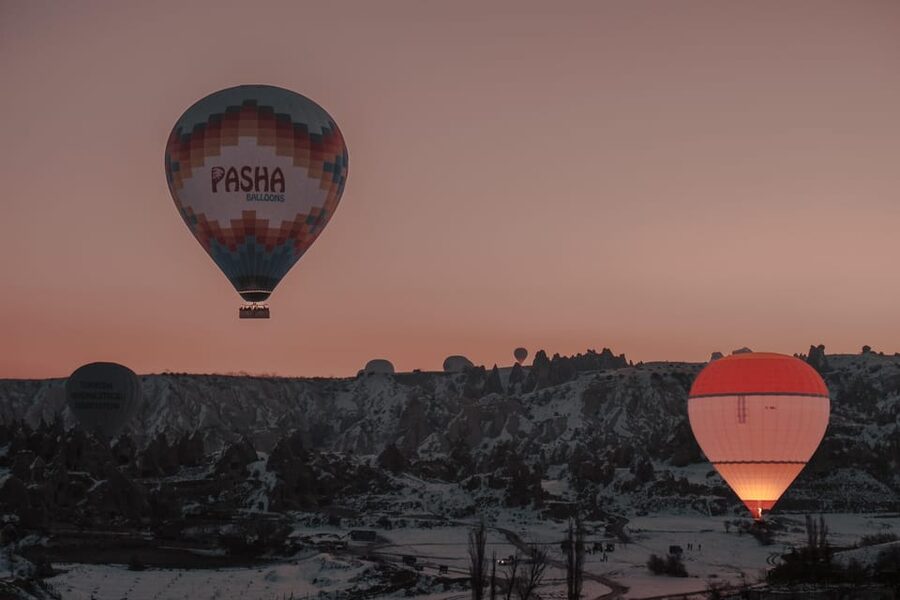 Cappadocia: Private Photoshoot Sunrise Balloon with Transfer - Weather, balloons, and winter conditions