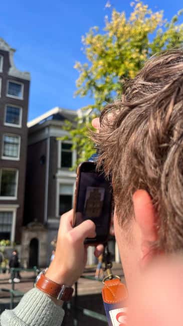 Capture Iconic Amsterdam: Photo Walk with a Pro Photographer - What you receive for $112