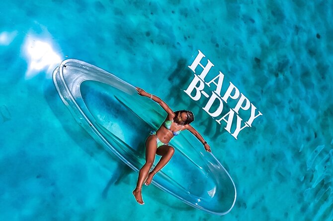 Clear Kayak Drone Photo Shoot and Video in Montego Bay - A clear kayak turns the sea into your backdrop