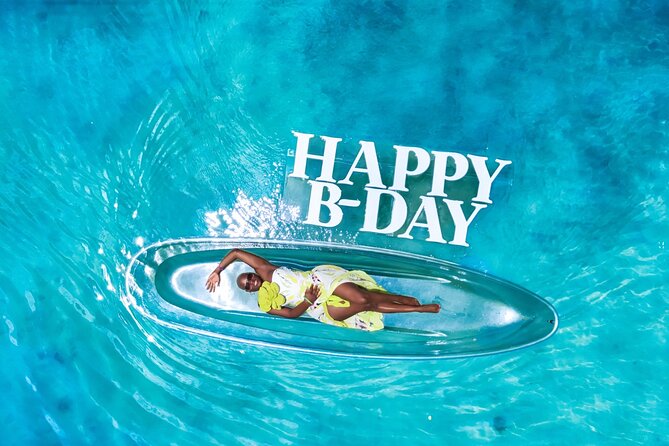 Clear Kayak Drone Photo Shoot and Video in Montego Bay - Flowers, Jamaica letters, and celebration extras