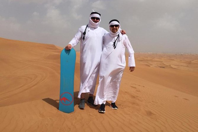 Desert Safari - Morning at Red Dunes, Sandboarding, Desert Photos - Sandboarding on the sandy slopes