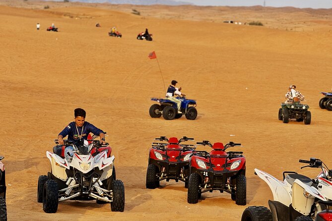 Dubai Desert Safari Camel Ride Sunset Photography and BBQ Dinner - Sandboarding and the first desert photographs