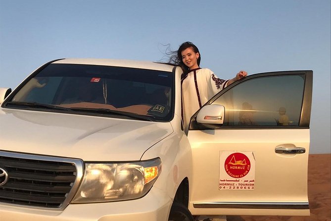 Dubai Half day Desert Safari Quad Bike & Flying Dress Photoshoot - The 30 to 45 minute dune-bashing run