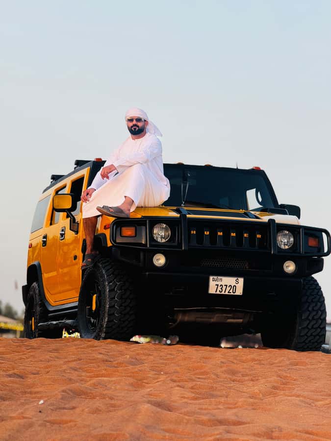 Dubai Hummer Safari Adventure & Traditional Dress Photoshoot - Sandboarding and the short camel ride