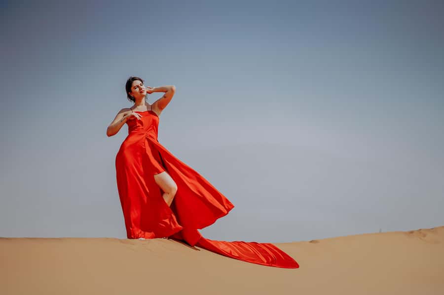 Dubai: Private Flying Dress Photography and Dune Drive Trip - The dune drive adds motion before the camera comes out