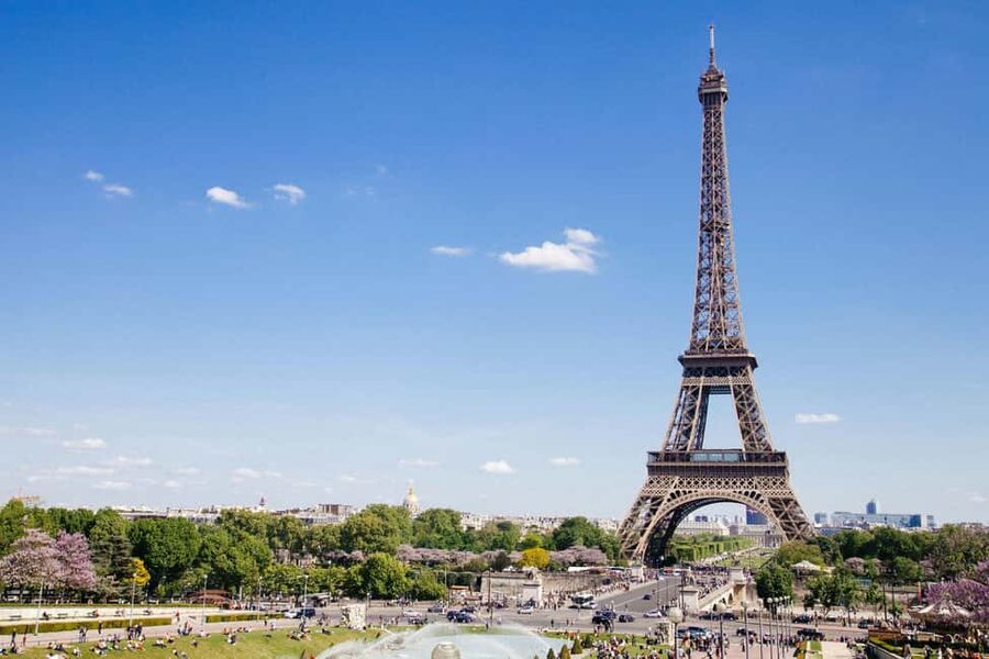 Eiffel Tower Reserved Access with Photoshoot stops - Crossing Passerelle Debilly for the first view