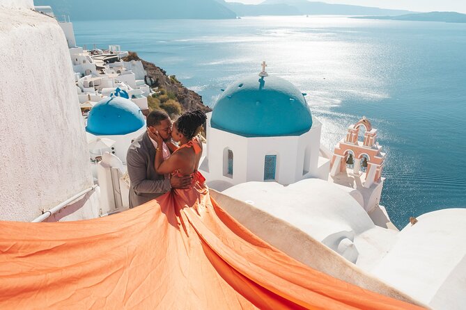 Flying Dress Santorini Photoshoot - Blue domes, churches, and the caldera