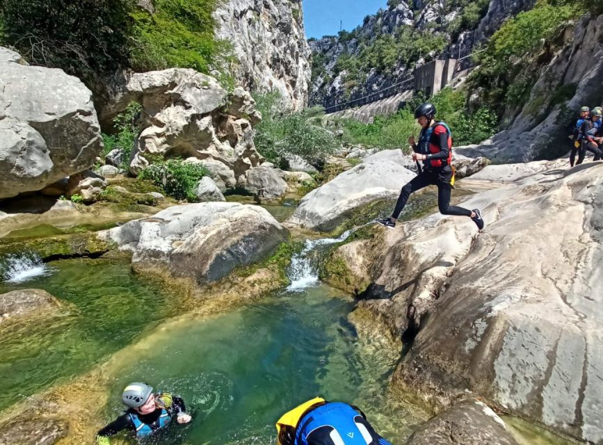 From Split/Omiš: Canyoning Cetina River + Free Photos/Video - Passing beneath the 50-meter waterfall