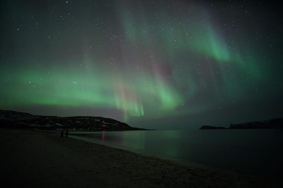 From Tromsø: Aurora Bus Tour with Snacks, Photos, and Drinks - Crossing into Finland when conditions require it