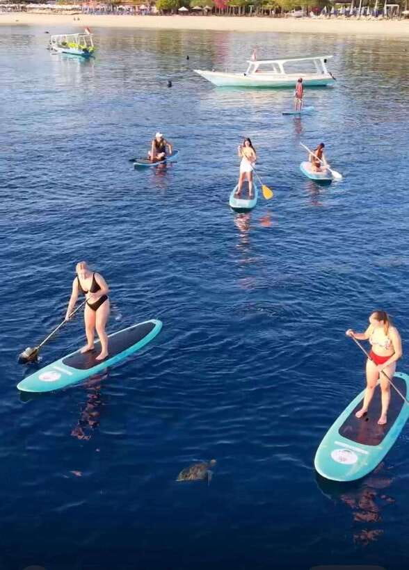 Gili sunrise stand-up paddle boarding (drone photoshoot) - Learning to stand before the sun rises