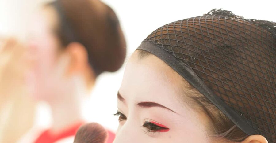 Kyoto: Maiko Makeover and Photoshoot Experience - Getting dressed is part of the cultural lesson