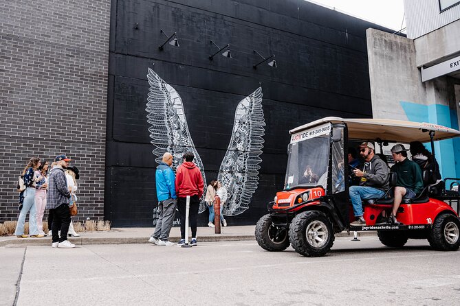 Murals of Nashville Instagram Tour by Golf Cart - The Gulch and the famous What Lifts You mural