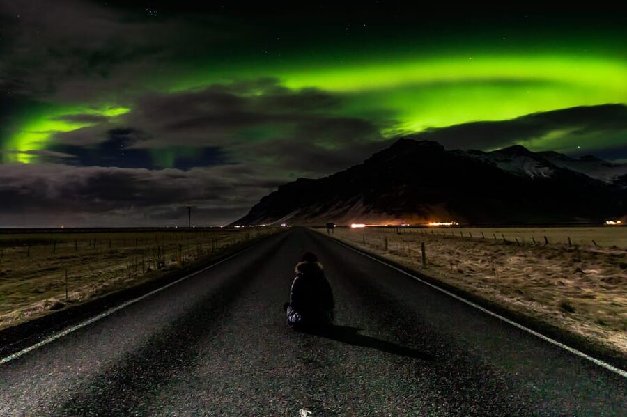 Northern Lights in Mini Bus, Photos, Hot Cocoa and Pastries - Waiting outdoors with cocoa and Icelandic pastry