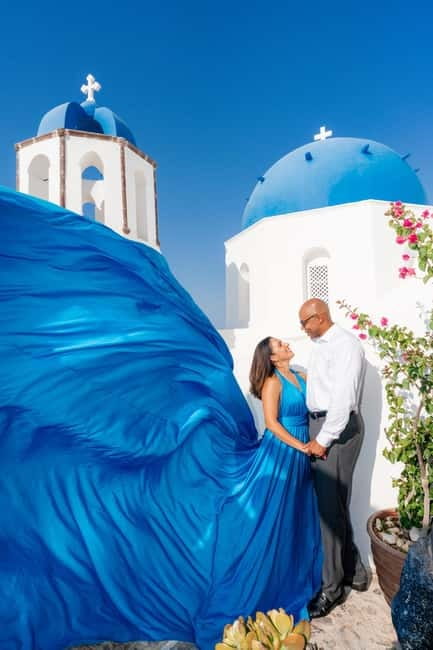 Oia: Santorini Photoshoot with Flying Dress Rental Option - A Comfortable Setup for People Who Dislike Posing