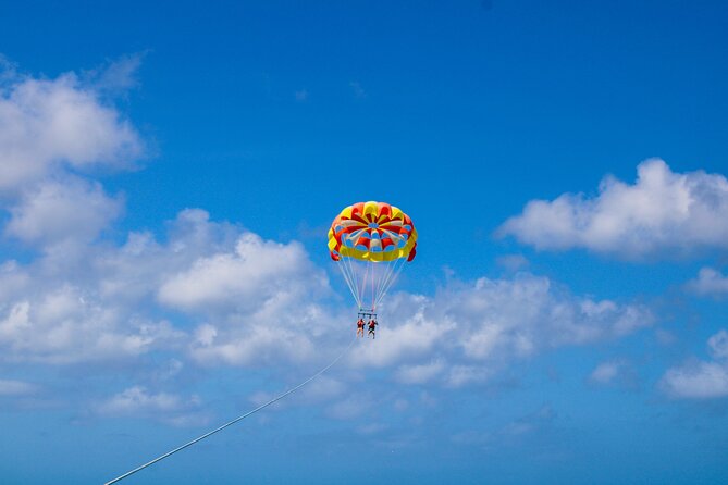 Parasailing and Photography Session Experience - Timing, weather, and cancellation details