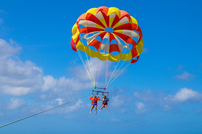 Parasailing and Photography Session Experience - Getting fitted for a single, tandem, or triple flight