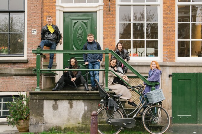 Personalized Amsterdam Photoshoot with Professional Photographer - Dam Square and the central city