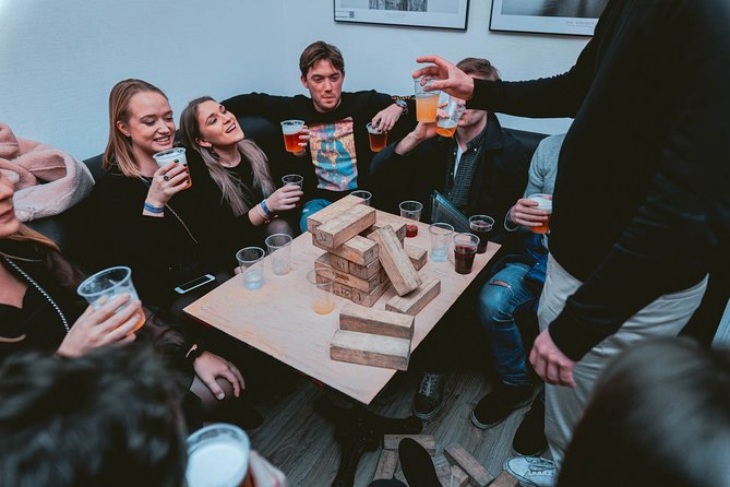 Pub Crawl + Unlimited Drinks + VIP entry + Drinking Games & Photographer - The first stop: games, introductions, and the open bar