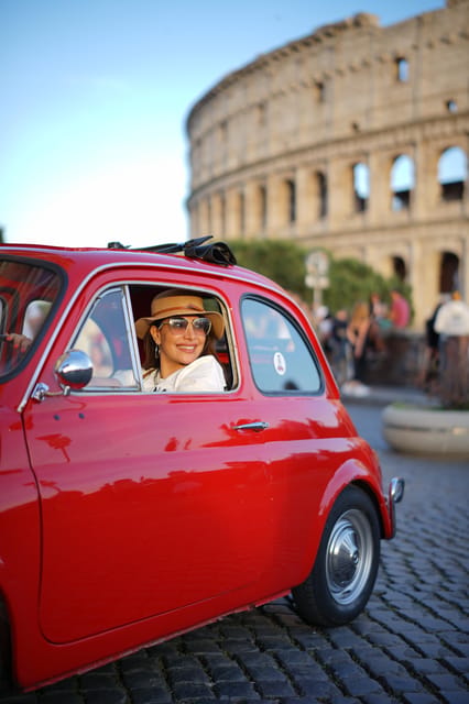 Rome Pro Photoshoot Service with Free Transport by Fiat 500 - The Colosseum begins the photo session