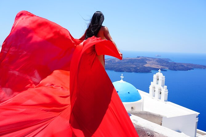 Santorini 2h Private Flying Dress Photoshoot with Transportation - Oia brings the classic blue-domed backdrop