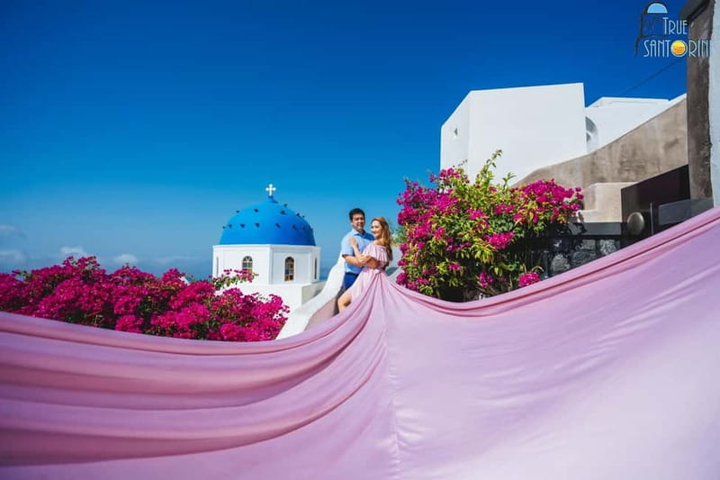 Santorini:FlyingDress Photoshoot with edited pics and pickup - A one-hour photo session built around Santorini’s best views