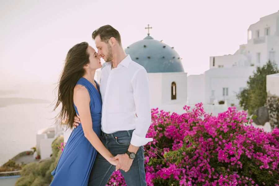 Santorini: Imerovigli Professional Photoshoot in Blue Dome - The photo session focuses on backgrounds, poses, and natural expressions