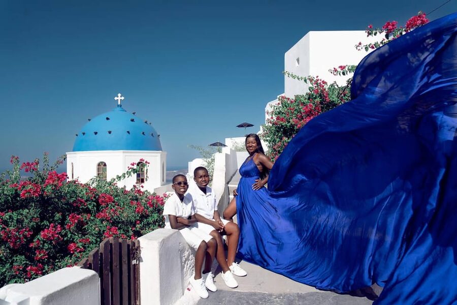 Santorini: Proposal Photoshoot l Private Entry to blue Dome - A private proposal in Santorini’s most recognizable setting
