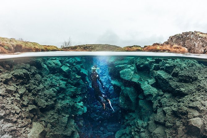 Silfra Wetsuit Snorkeling Tour with Underwater Photos - From Reykjavik - Floating through the fissure