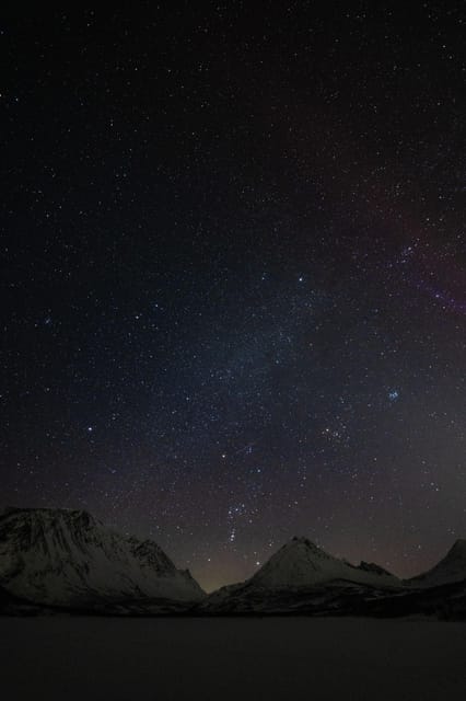 Tromsø: Aurora Tour with Photos, Campfire and Arctic Food - Staying warm for several hours outside