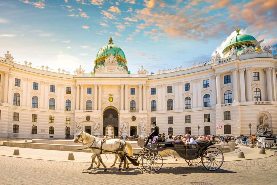 Vienna: Christmas Photoshoot with a Pro Photographer - Ankeruhr and the final walk to Stephansplatz